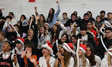  students celebrating at school pep rally